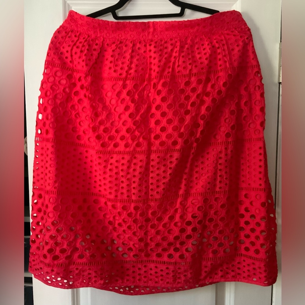 Bright coral mini skirt with cutout detail overlay